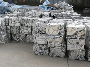 What is the process of pressing metal