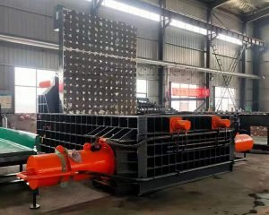 How does a metal compactor work