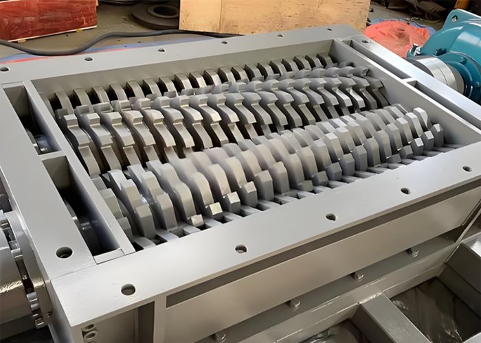 What is an industrial shredder that handles factory scraps?