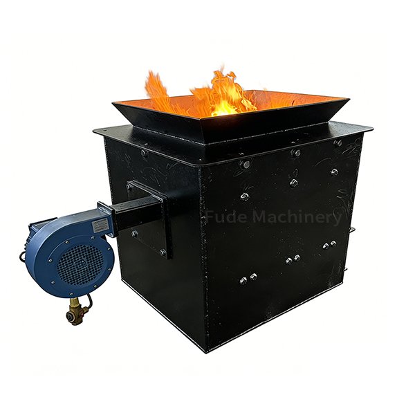 Industrial square metal furnace with an open-top flame and a blue external blower mounted on the side, used for heating or burning fuel.